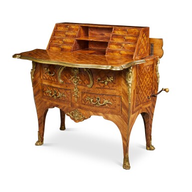 View full screen - View 1 of Lot 41. A Louis XV Gilt-Bronze Mounted Bois Satiné Commode-Secrétaire by Charles Cressent, Circa 1735.