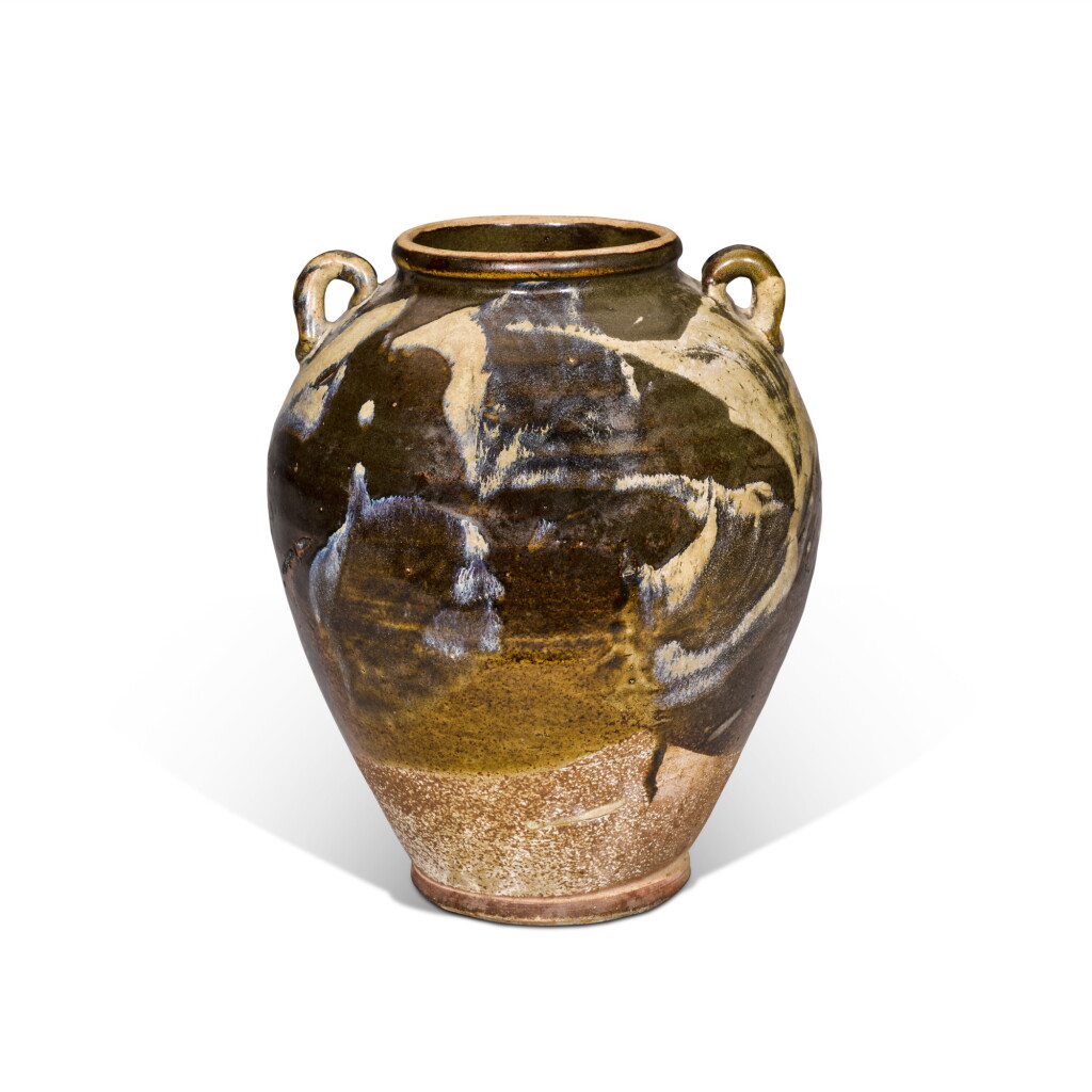 View full screen - View 1 of Lot 885. A phosphatic-splashed jar, Tang dynasty .