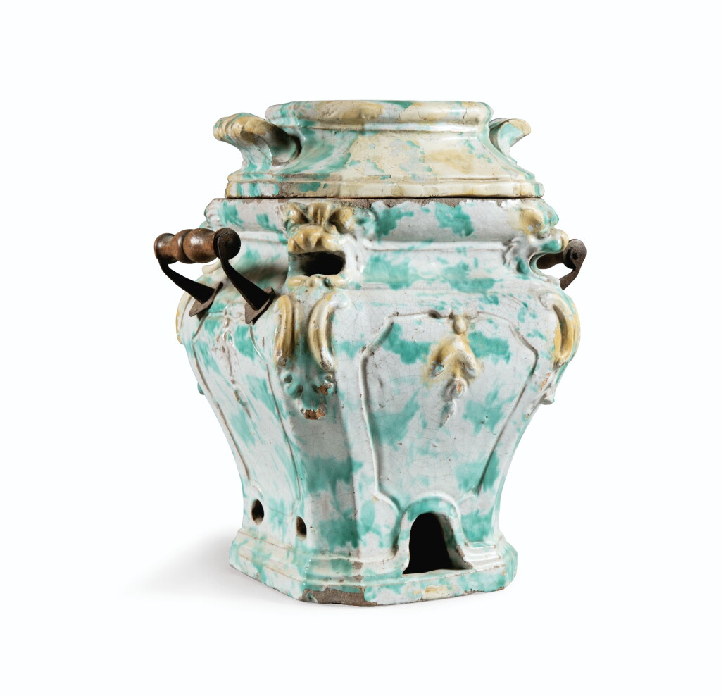 View full screen - View 1 of Lot 53. A FRENCH EARTHENWARE STOVE, 18TH CENTURY | PETIT POÊLE EN FAÏENCE DE L'EST DE LA FRANCE DU XVIIIÈME SIÈCLE.