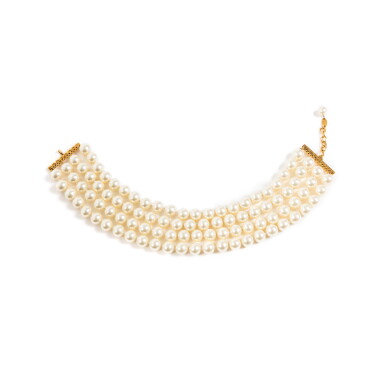 View full screen - View 1 of Lot 607. Frances Patiky Stein's Collection: One Faux-Pearl Choker, Circa 1984-1992.