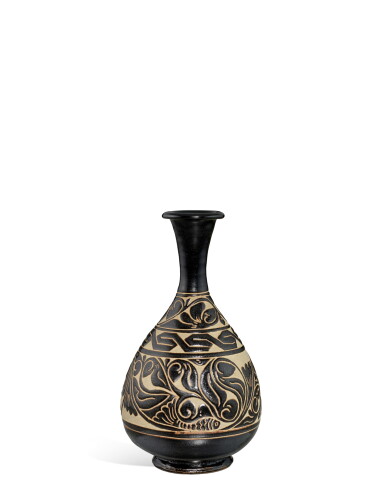 View full screen - View 1 of Lot 3708. A Cizhou brown-glazed carved 'fish and floral' vase, yuhuchunping, Northern Song - Yuan dynasty | 北宋至元 磁州褐釉剔刻纏枝花魚紋玉壺春瓶.