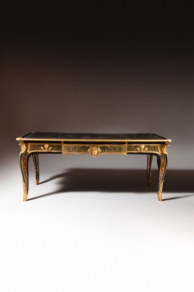 View full screen - View 1 of Lot 29. A Louis XV gilt-bronze mounted ebony and brass in contrepartie marquetry bureau plat "à têtes de satyres", the model created by André-Charles Boulle, circa 1730-1760, some gilt-bronzes stamped with the crowned C.