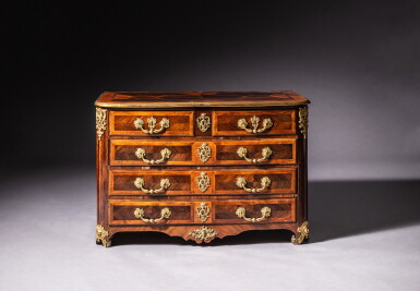 View full screen - View 1 of Lot 126. A late Louis XIV gilt-bronze mounted rosewood veneered commode, circa 1710-1715 | Commode en placage de palissandre et bronze redoré, d'époque Louis XIV, vers 1710-1715.