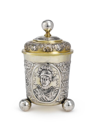View full screen - View 1 of Lot 150. A GERMAN PARCEL-GILT SILVER BEAKER AND COVER, MAKER'S MARK BR IN OVAL, CIRCA 1710.