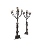 Paire de candélabres monumentaux en bronze patiné et fonte de fer, fin du XIXe-début XXe siècle, d'après le modèle réalisé par Maso di Bartolomeo pour le Duomo de Pistoia