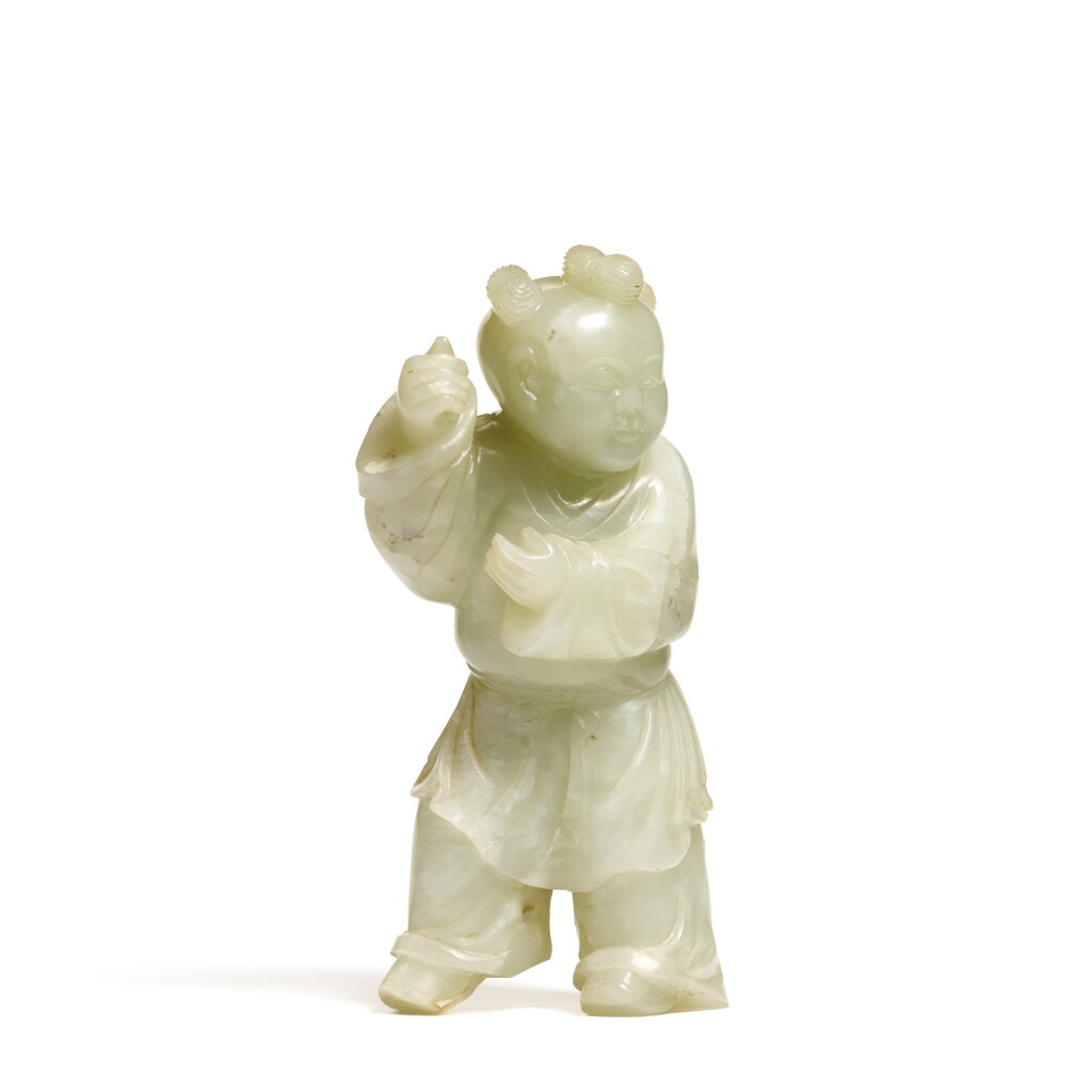 View full screen - View 1 of Lot 961. A pale celadon jade figure of a boy, Qing dynasty, 18th century.