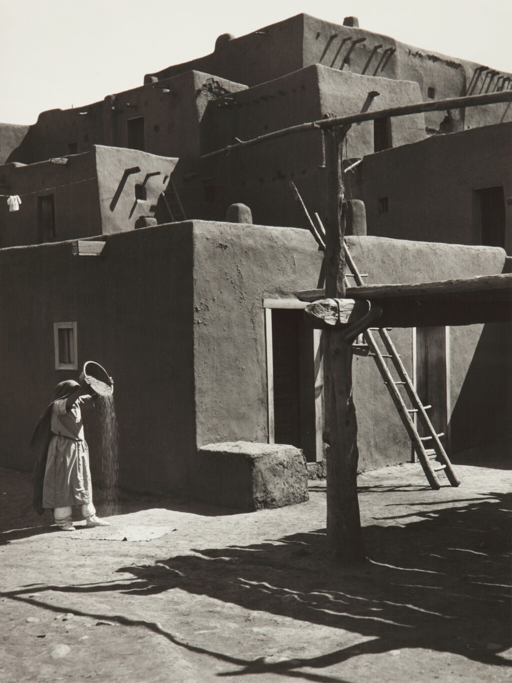 View full screen - View 1 of Lot 121. 'Winnowing Grain, Taos Pueblo, New Mexico'.