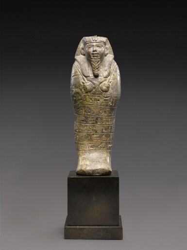 View full screen - View 1 of Lot 126. An Egyptian Serpentine Ushabti of King Senkamenisken, Nubia, Napatan Period, 643-623 B.C..