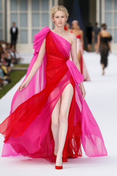 View full screen - View 1 of Lot 35. Red and Fuchsia Pink Silk Chiffon Asymmetrically Draped Couture Gown, Worn by Marisa Tomei for the 2019 Emmy Awards, Autumn-Winter 2019/20 Collection.
