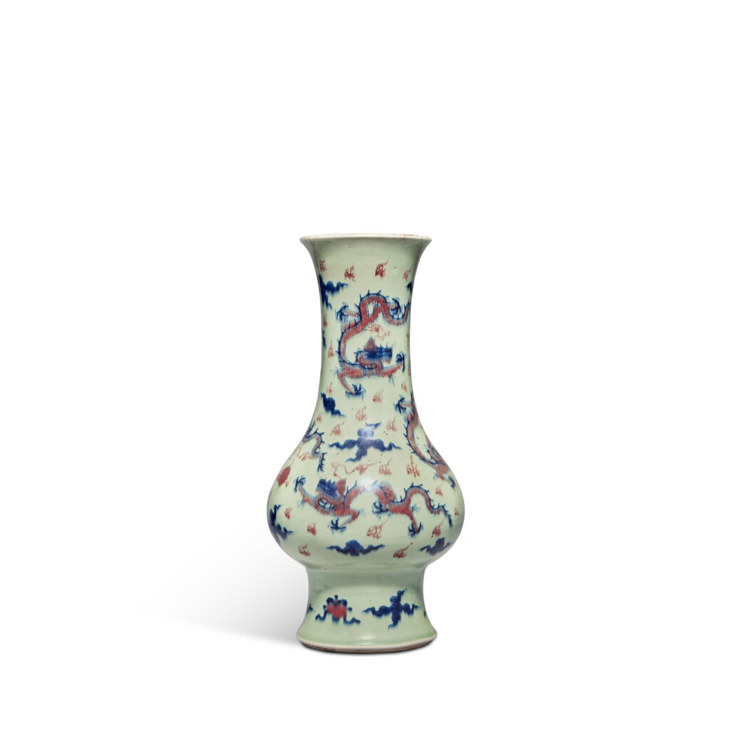 View full screen - View 1 of Lot 50. A celadon-ground underglaze-blue and copper-red 'dragon' vase, Qing dynasty.