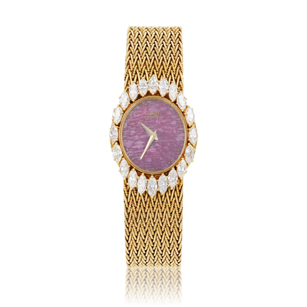 View full screen - View 1 of Lot 372. Piaget | Montre bracelet de dame rubis or et diamants | Lady's ruby gold and diamond bracelet watch.