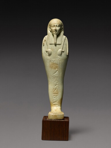 View full screen - View 1 of Lot 211. An Egyptian Pale Blue-green Faience Ushabti, 30th Dynasty, 380-342 B.C..