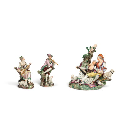View full screen - View 1 of Lot 735. A Ludwigsburg porcelain figure group of a shepherd and shepherdess and a pair of Ludwigsburg figures of a shepherd and shepherdess playing instruments, circa 1765.