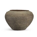 A large Chinese pottery jar, Han dynasty or later