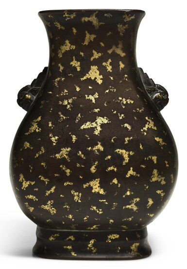 View full screen - View 1 of Lot 289. A GOLD-SPLASHED BRONZE VASE QING DYNASTY, 19TH CENTURY | 清十九世紀 銅灑金獸耳方壺.