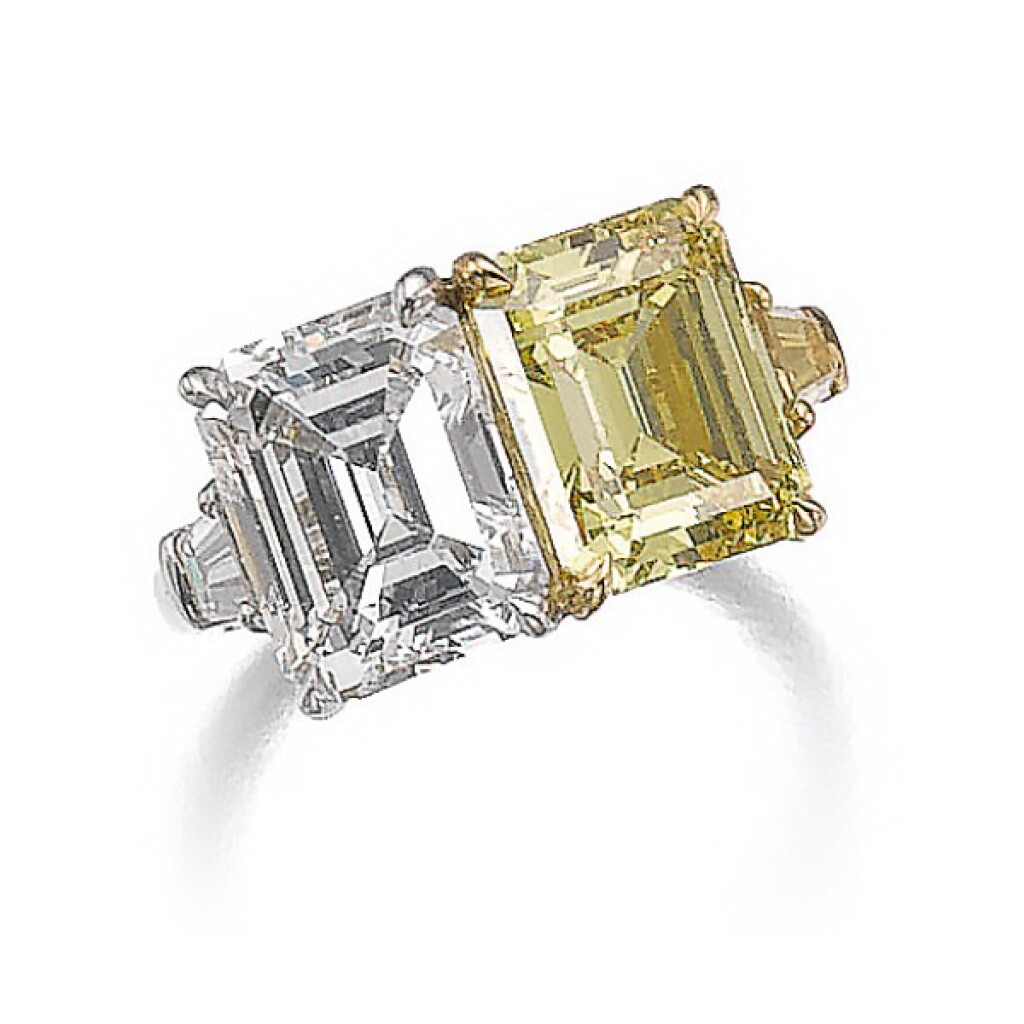 View full screen - View 1 of Lot 345. FANCY VIVID YELLOW DIAMOND AND DIAMOND RING.