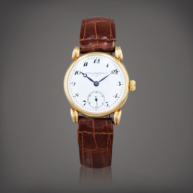 View full screen - View 1 of Lot 385. Montre bracelet officier en or jaune | Yellow gold officier-shaped wristwatch Faite en 1912 | Made in 1912.