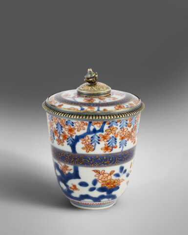 View full screen - View 1 of Lot 506. A Régence Silver-Gilt-Mounted Imari Porcelain Covered Beaker, Paris, 1717-22 .