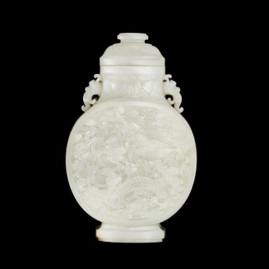 View full screen - View 1 of Lot 3610. A white jade 'dragon' moonflask, Qing dynasty, Qianlong period | 清乾隆 白玉雲龍紋雙龍耳扁壺.