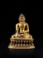 A finely cast gilt-bronze figure of Shakyamuni Buddha, Tibet, 14th century | 西藏 十四世紀 鎏金銅釋迦牟尼佛坐像