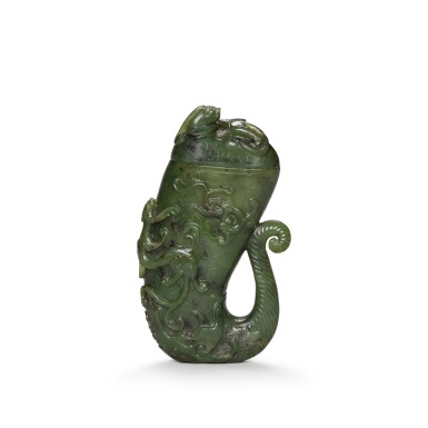 View full screen - View 1 of Lot 43. A spinach-green jade rhyton and cover, Qing dynasty, 18th/19th century | 清十八/十九世紀 碧玉螭龍紋角盃連蓋.
