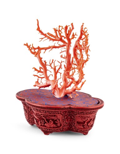 View full screen - View 1 of Lot 205. Jardinière en laque cinabre sculpté et embellie d'un arbre en corail Dynastie Qing, XVIIIE-XIXE siècle | 清十八至十九世紀 剔紅開光人物故事圖海棠式花盆連紅珊瑚盆景 | A carved red-lacquer jardiniere with a coral tree, Qing Dynasty, 18th-19th century.