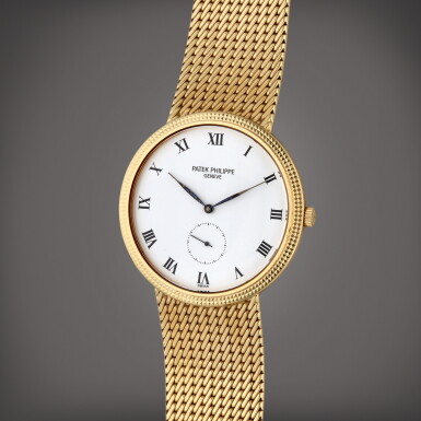 View full screen - View 1 of Lot 218. Reference 3919/005 Calatrava | A yellow gold bracelet watch, Circa 1994.