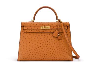 View full screen - View 1 of Lot 1. Kelly 35 Gold Colour in Ostrich Leather with gold Hardware. Hermès. 2001..