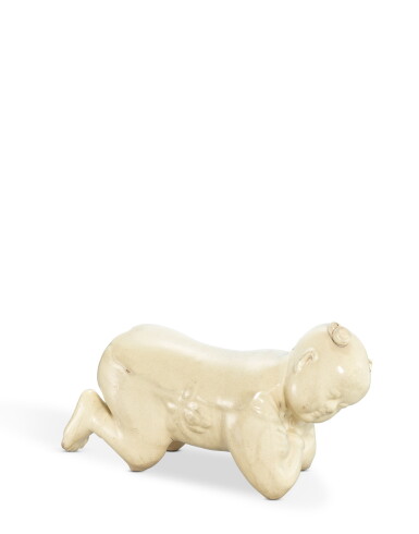 View full screen - View 1 of Lot 3713. A Cizhou-type white-glazed 'boy' pillow, Ming dynasty | 明 磁州窰系白釉嬰兒枕.