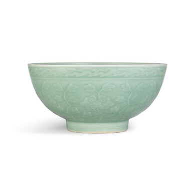 View full screen - View 1 of Lot 3629. A moulded and incised celadon-glazed 'herbaceous peony' bowl Seal mark and period of Qianlong | 清乾隆 粉青釉纏枝芍藥大盌 《大清乾隆年製》款.