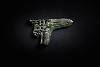 View full screen - View 1 of Lot 143. An archaic bronze halberd (Ge), Eastern Zhou dynasty, Warring States period.