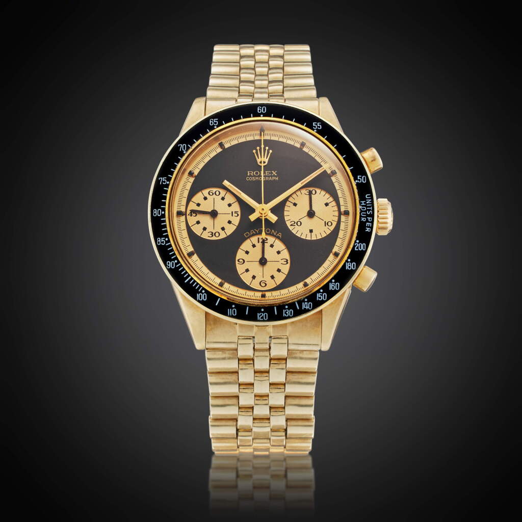 View full screen - View 1 of Lot 36. Reference 6241 Daytona Paul Newman 'John Player Special' | A yellow gold chronograph wristwatch with bracelet, Owned and Worn by Tom Brady, Circa 1969.