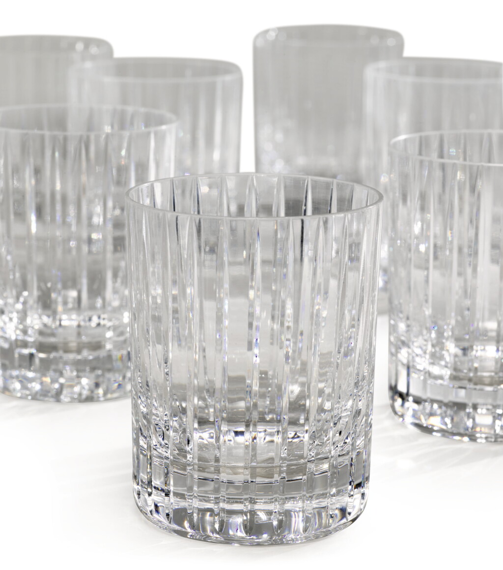 View full screen - View 1 of Lot 1050. A SET OF SEVEN BACCARAT CUT GLASS 'HARMONIE' TUMBLERS, MODERN.
