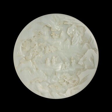 View full screen - View 1 of Lot 523. A finely carved white jade 'figural' circular table screen, Qing dynasty, Qianlong period | 清乾隆 白玉雕祝壽圖插屏.