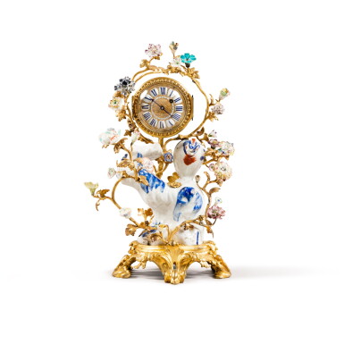 View full screen - View 1 of Lot 346. A Louis XV gilt-bronze mounted Arita Japanese porcelain mantel clock, circa 1730 | Pendule en porcelaine du Japon Arita et monture de bronze doré d'époque Louis XV, vers 1730.