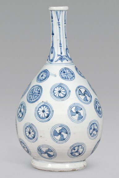 View full screen - View 1 of Lot 99. A FINE SHOKI IMARI BOTTLE VASE, EDO PERIOD, CIRCA 1640-50.
