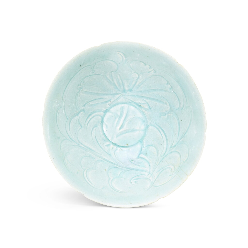 View full screen - View 1 of Lot 438. A qingbai carved 'peony' bowl, Song dynasty 宋 青白釉刻牡丹紋笠式盌.