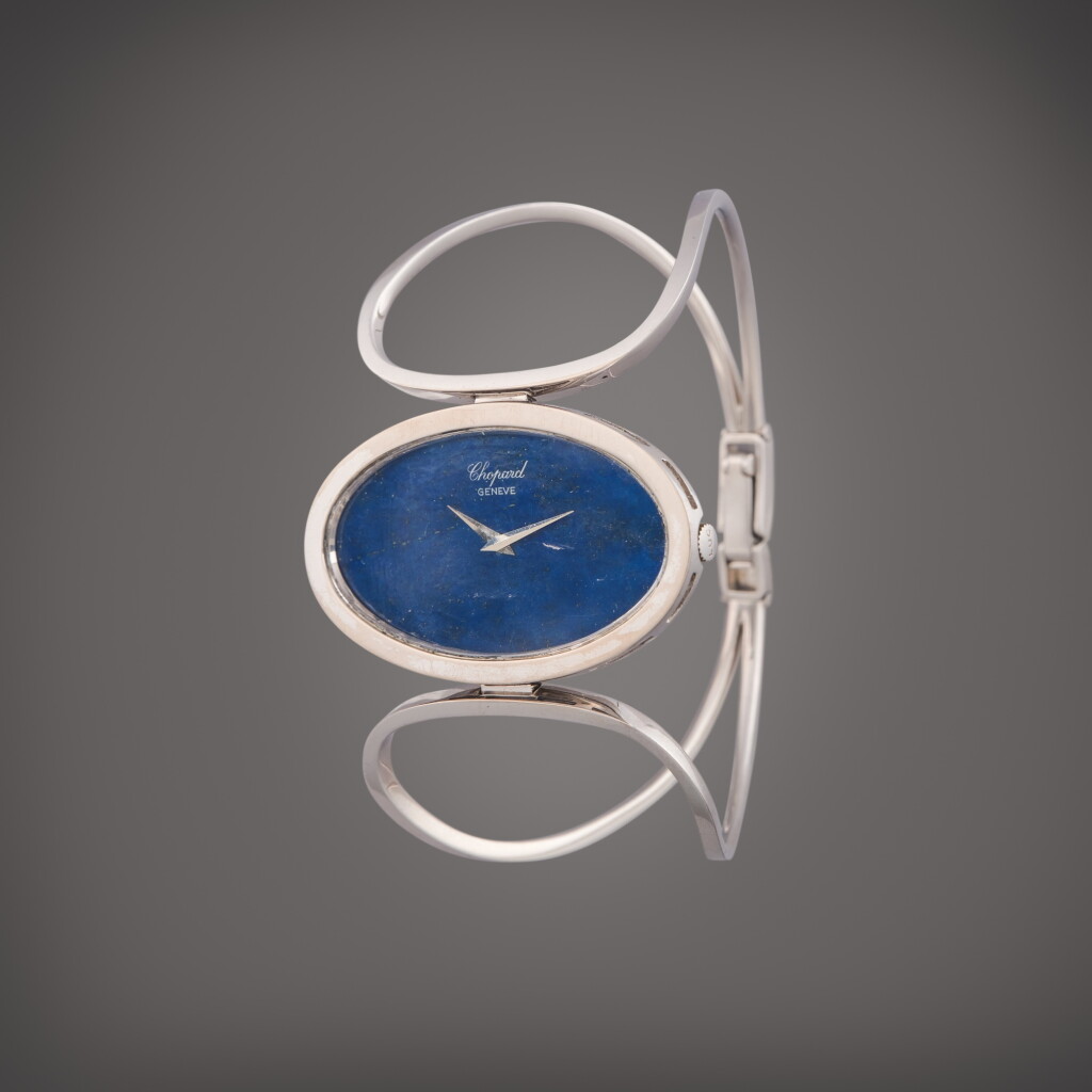全螢幕檢視 - 查看401Reference 5032 | A white gold cuff bracelet watch with lapis lazuli dial, Circa 1978的1