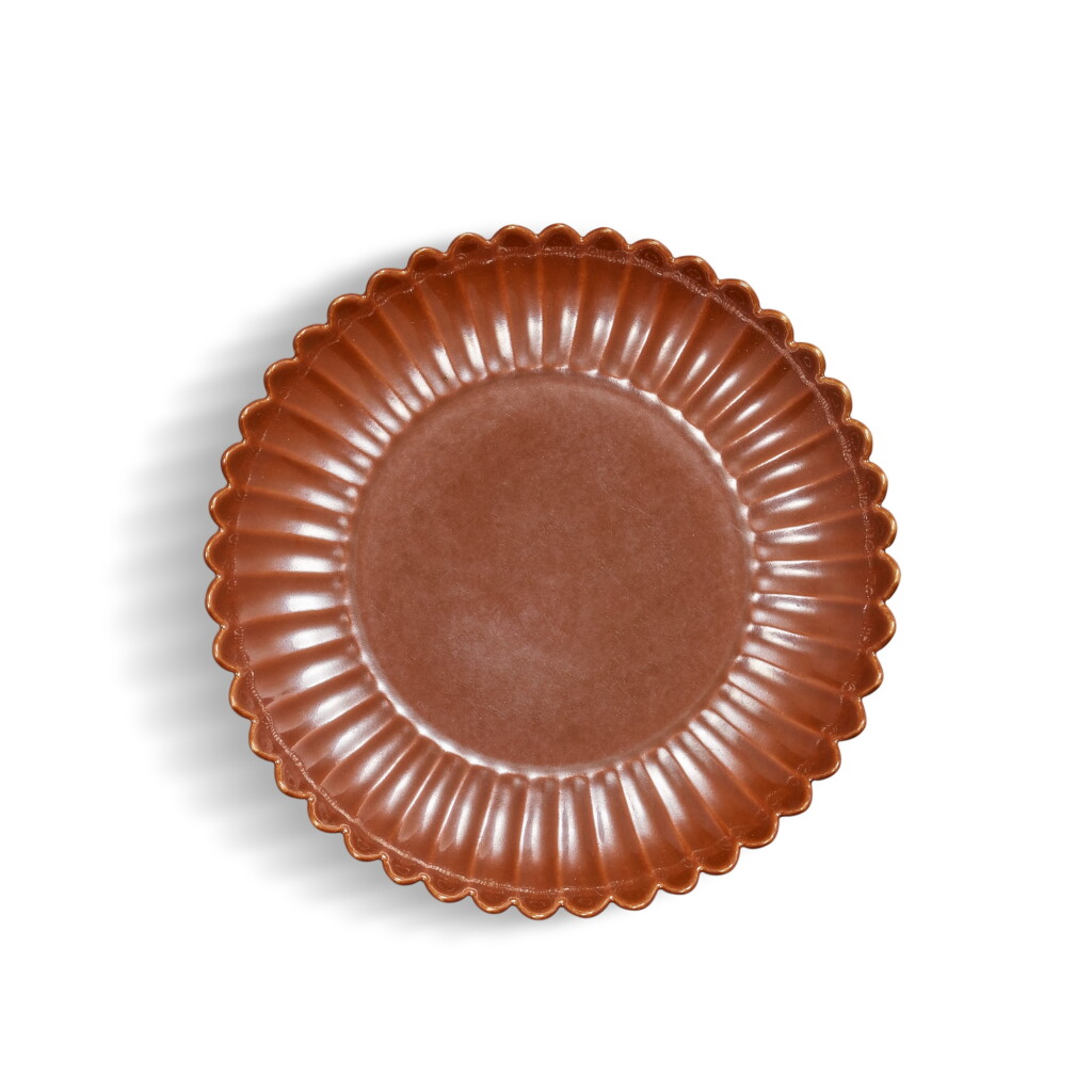 View full screen - View 1 of Lot 5550. A café-au-lait-glazed 'chrysanthemums' dish, Seal mark and period of Qianlong | 清乾隆 紫金釉菊瓣盤 《大清乾隆年製》款.