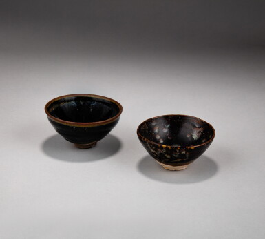 View full screen - View 1 of Lot 10. A 'Jian' ‘hare’s fur’ tea bowl and a 'Jizhou' ‘tortoiseshell’ bowl, Song dynasty | 宋 建窰黑釉兔毫茶盞及吉州窰玳瑁釉盌一組兩件.