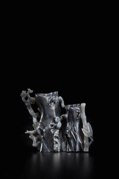 View full screen - View 1 of Lot 365. A black and gray jade double 'prunus' vase, Qing dynasty, Qianlong period, late 18th century.