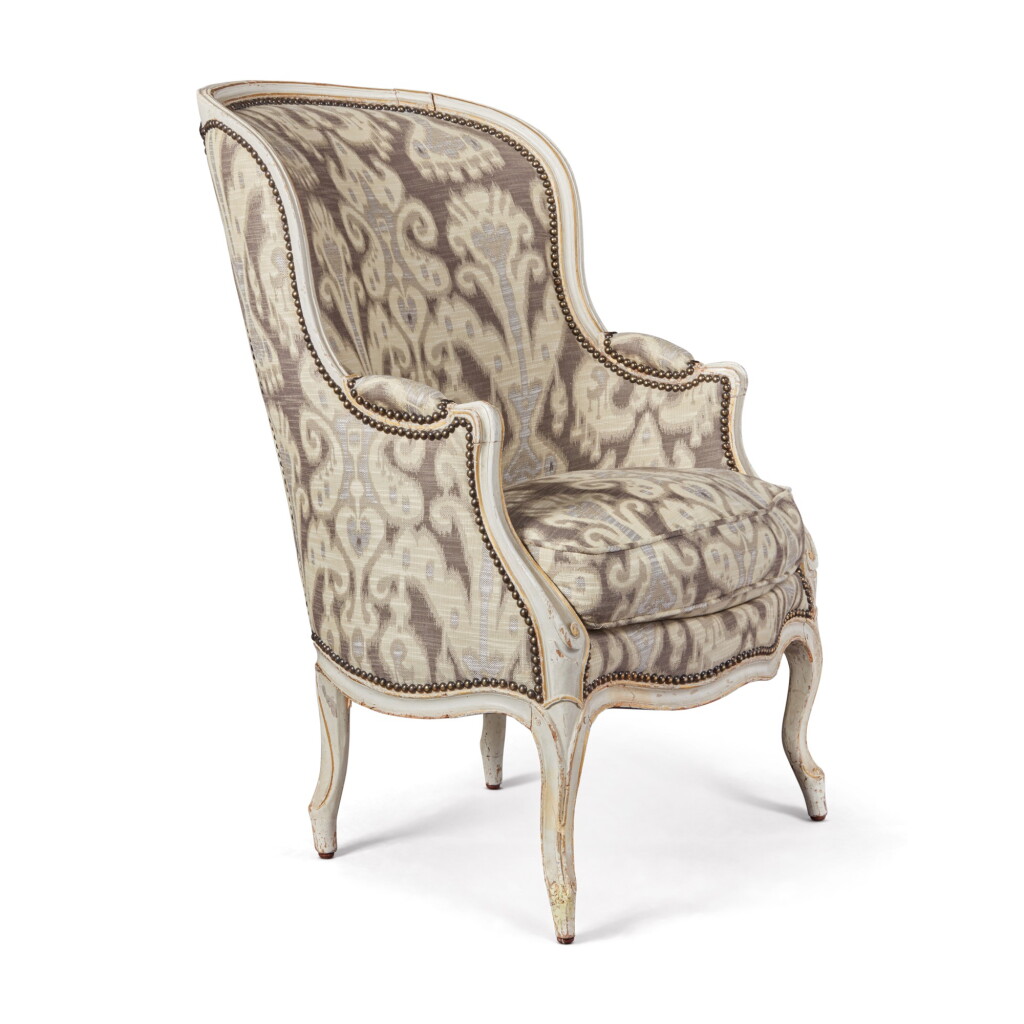 View full screen - View 1 of Lot 221. A Louis XV White Painted and Parcel Gilt Bergère en Gondole by Pierre Plée, Circa 1767.
