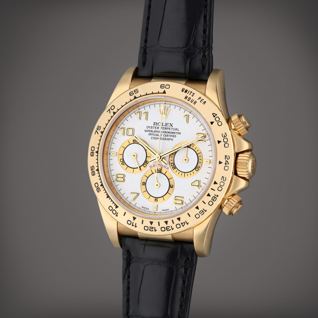 View full screen - View 1 of Lot 205. Reference 16518 Daytona | A yellow gold automatic chronograph wristwatch, Circa 1999.
