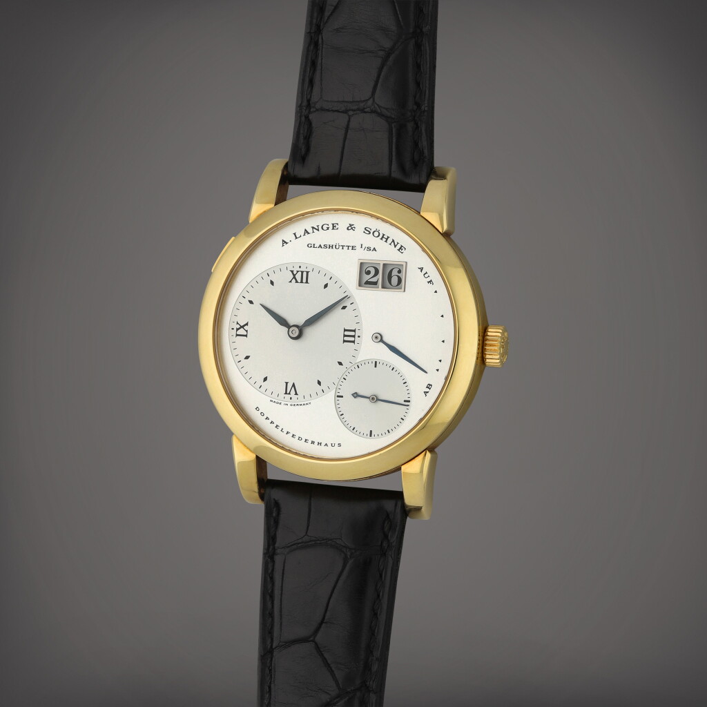 View full screen - View 1 of Lot 18. Lange 1, Reference 101.002 | A yellow gold wristwatch with digital date display and power reserve indication | Circa 1995 | 朗格 | Lange 1 型號101.002 | 黃金腕錶備數字日期及動力儲存顯示,製作年份約1995.