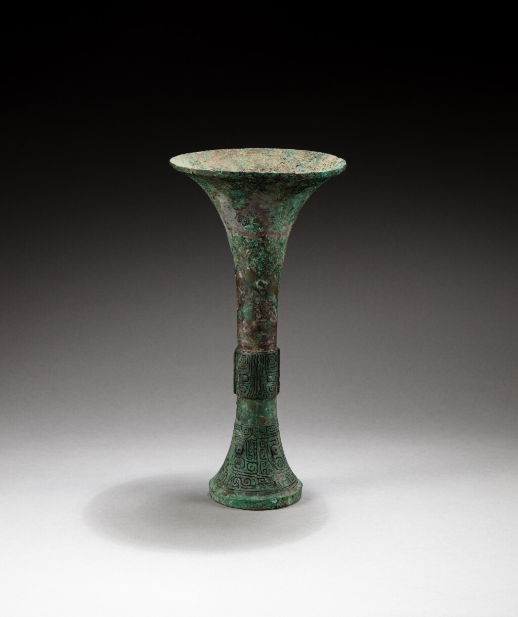 View full screen - View 1 of Lot 82. An archaic bronze beaker, gu Late Shang dynasty | 商晚期 青銅觚.