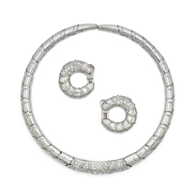 View full screen - View 1 of Lot 121. White Gold and Diamond 'Onda' Necklace and Pair of Earclips.