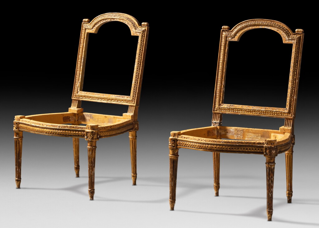 View full screen - View 1 of Lot 52. A pair of Royal giltwood chairs, Louis XVI, circa 1780, by Jean-Baptiste Boulard | Paire de chaises royales en bois doré d'époque Louis XVI, vers 1780, par Jean-Baptiste Boulard.