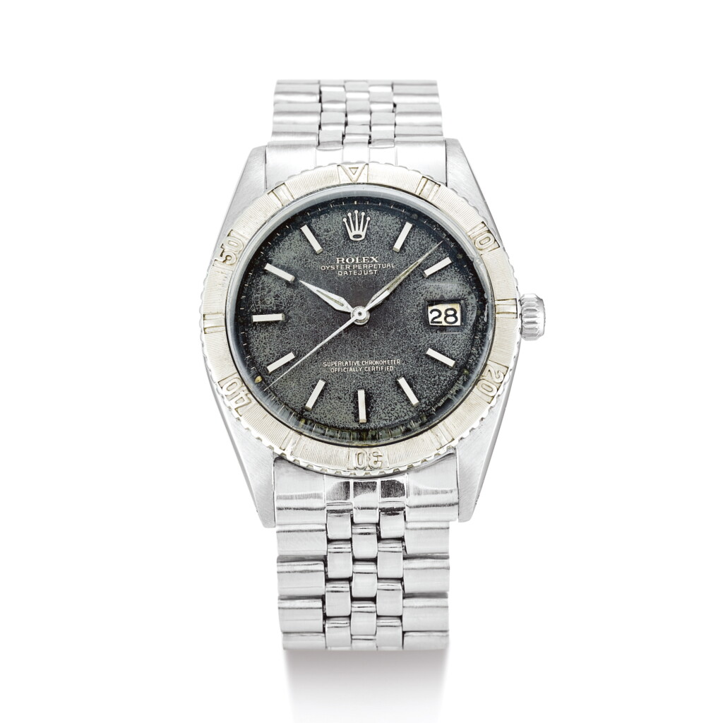 View full screen - View 1 of Lot 2191. ROLEX | 'THUNDERBIRD' DATEJUST, REFERENCE 1625 A STAINLESS STEEL WRISTWATCH WITH DATE, WHITE GOLD BEZEL AND BRACELET, CIRCA 1964" | 勞力士 | ""Thunderbird"" Datejust 型號1625 精鋼鏈帶腕錶,備日期顯示及白金圈片,錶殼編號1065591,約1964年製".