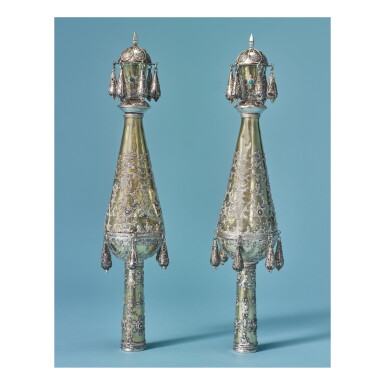 View full screen - View 1 of Lot 62. A PAIR OF NEAR EASTERN PARCEL-GILT SILVER TORAH FINIALS, EARLY 20TH CENTURY.