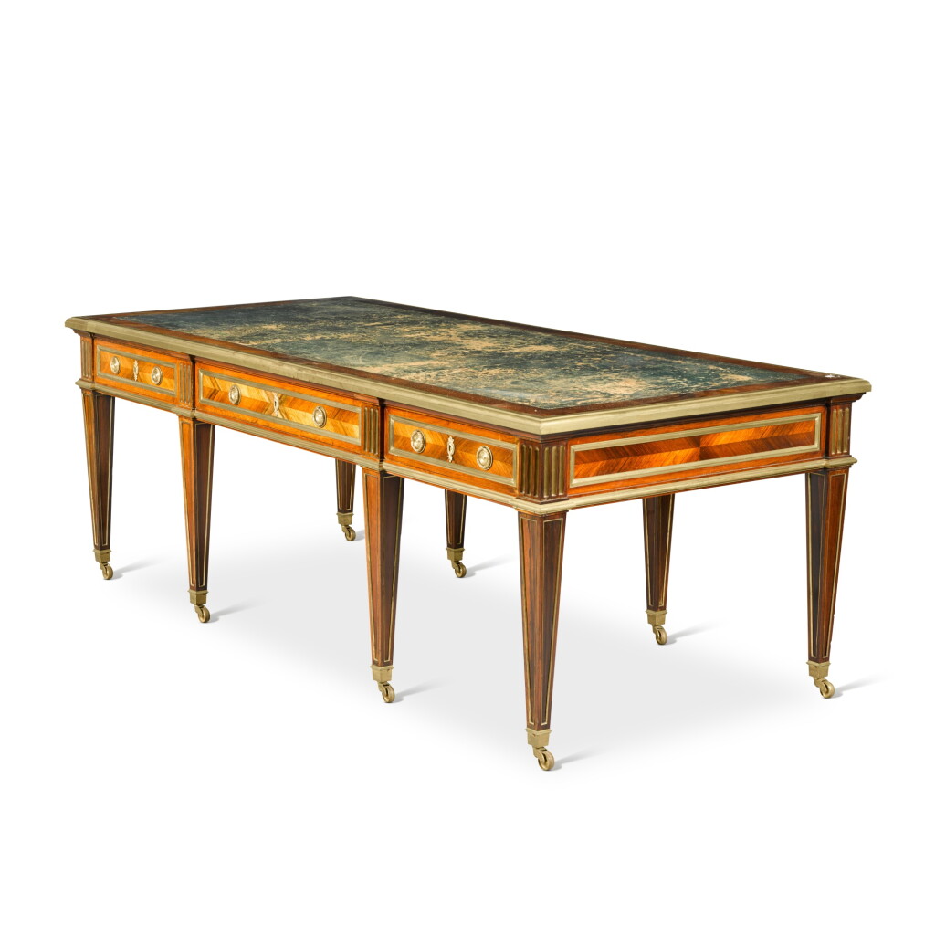 View full screen - View 1 of Lot 96. An English gilt-bronze and brass-mounted rosewood bureau plat, first half of the 19th century.